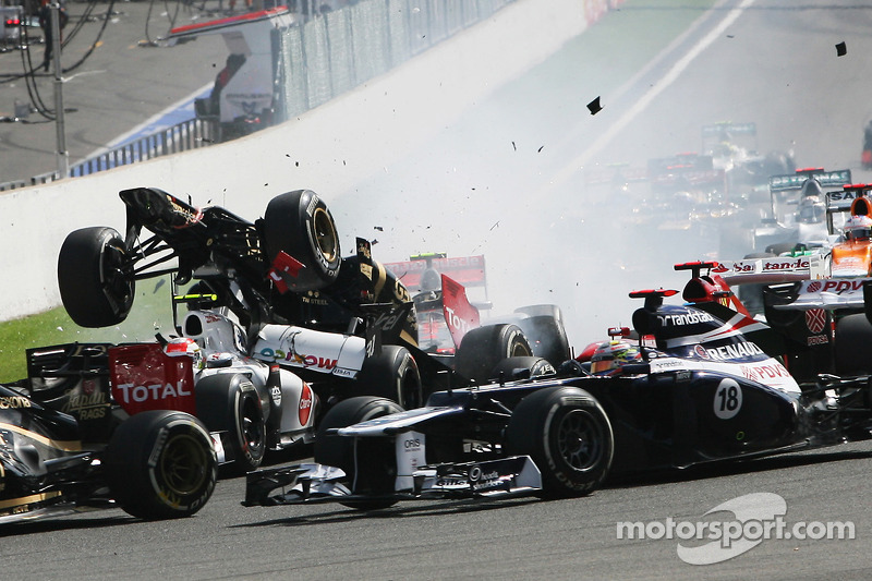 A crash at the start involving Lewis Hamilton, McLaren, Romain Grosjean, Lotus F1, Fernando Alonso, Ferrari, Kamui Kobayashi, Sauber