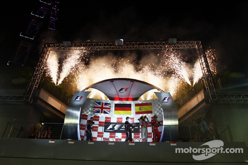 Podium: race winner Sebastian Vettel, Red Bull Racing, second place Jenson Button, McLaren Mercedes, third place Fernando Alonso, Scuderia Ferrari