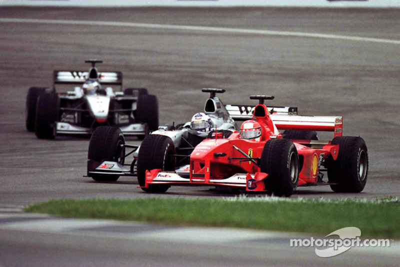 Michael Schumacher passes David Coulthard