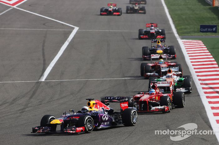 Sebastian Vettel, Red Bull Racing RB9 leads Fernando Alonso, Ferrari F138