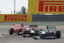 Nico Rosberg, Mercedes AMG F1 W04 leads Sebastian Vettel, Red Bull Racing RB9 and Fernando Alonso, Ferrari F138