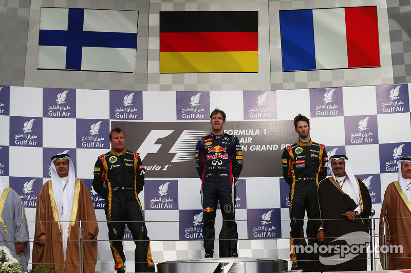 Podium: race winner Sebastian Vettel, Red Bull Racing, second place Kimi Raikkonen, Lotus F1 Team, third place Romain Grosjean, Lotus F1 Team