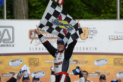 Race winner A.J. Allmendinger celebrates