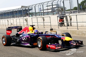 Daniel Ricciardo, Red Bull Racing RB9 Test Driver leaves the pits