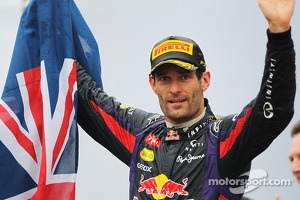 Mark Webber, Red Bull Racing celebrates his second position and final GP on the podium