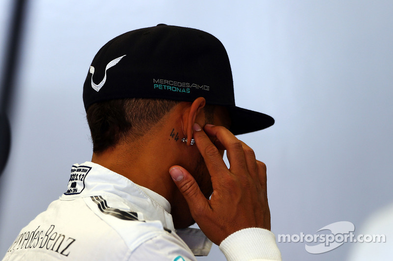 lewis hamilton mercedes amg f1 with a 44 tattoo next to lewis hamilton mercedes amg f1 with a 44 tattoo next to
