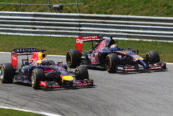 Sebastian Vettel, Red Bull Racing RB10 and Jean-Eric Vergne, Scuderia Toro Rosso STR9