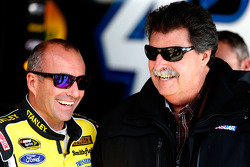 Marcos Ambrose and NASCAR president Mike Helton