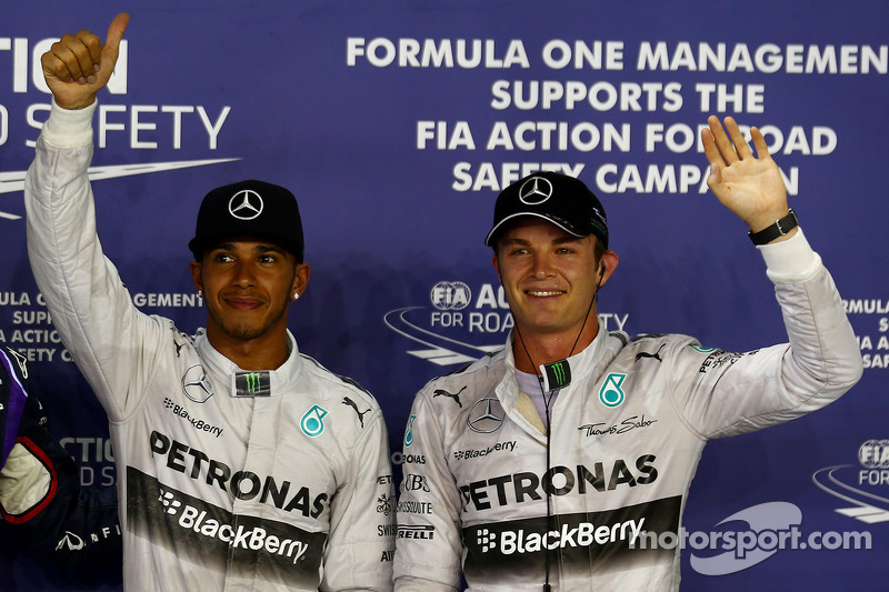 Ganador de la pole position Lewis Hamilton y el tercer puesto Nico Rosberg