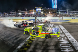 NASCAR Camping World Truck Series 2014 champion Matt Crafton celebrates with race winner Darrell Wallace Jr. and Kyle Busch