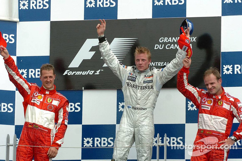 Podio: ganador de la carrera Kimi Raikkonen, segundo lugar Michael Schumacher y tercer lugar Rubens 