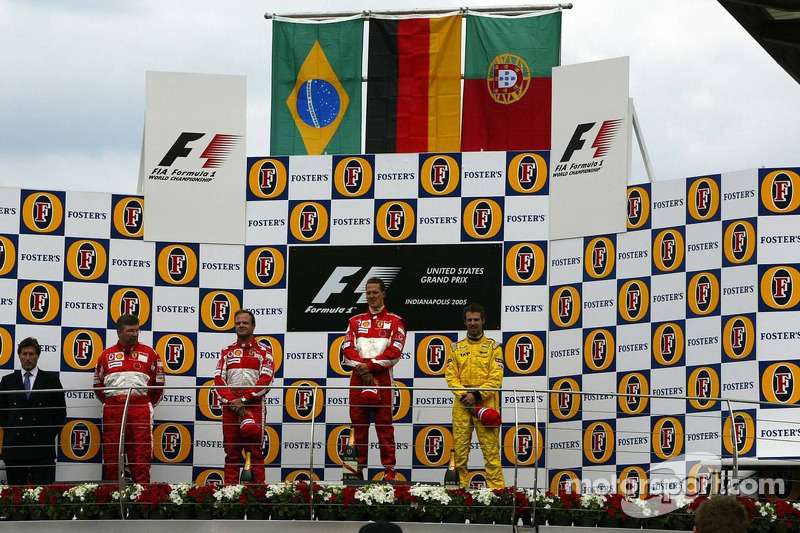 Podium: race winner Michael Schumacher with Rubens Barrichello and Tiago Monteiro