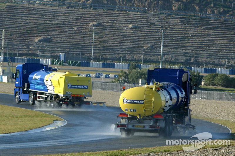 Water trucks wet the track for Michelin wet testing