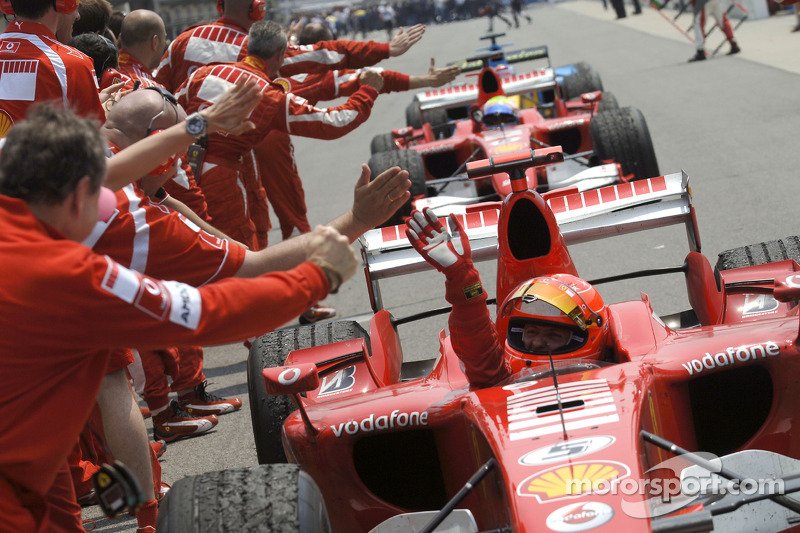 Race winner Michael Schumacher celebrates