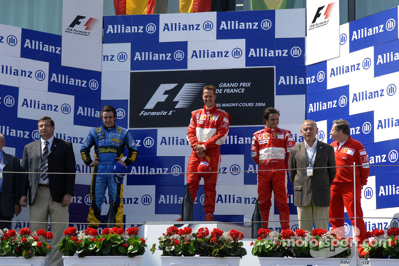 Podium: race winner Michael Schumacher with Fernando Alonso and Felipe Massa