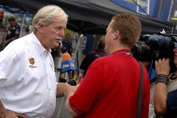 Robert Yates chats with a TV crew