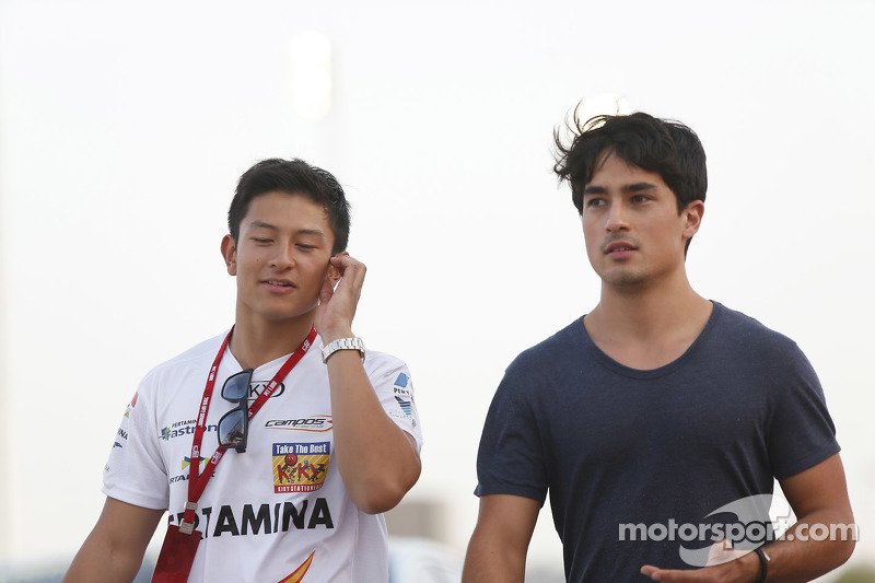 Rio Haryanto bersama Marlon Stöckinger di area Paddock.