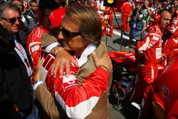 Luca di Montezemolo hugs Michael Schumacher