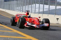 Race winner Felipe Massa celebrates