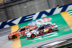 Daniel Suarez, Joe Gibbs Racing Toyota and Brad Keselowski, Team Penske Ford