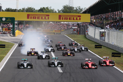 Нико Росберг, Mercedes AMG F1 W06; Льюис Хэмилтон, Mercedes AMG F1 W06; Себастьян Феттель, Ferrari S