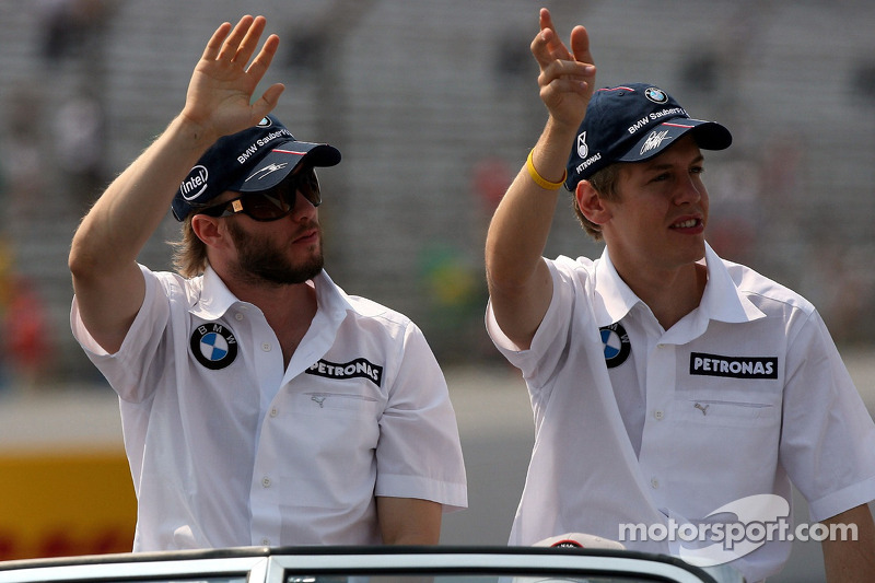 Нік Хайдфельд, BMW Sauber F1 Team та Себастьян Феттель, тест-пілот, BMW Sauber F1 Team на параді пілотів