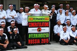 (L to R): Fernando Alonso, McLaren celebrates his 250th GP with Eric Boullier, McLaren Racing Director, Jenson Button, McLaren, and the team