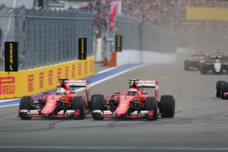 (L to R): Sebastian Vettel, Ferrari SF15-T and team mate Kimi Raikkonen, Ferrari SF15-T battle for position