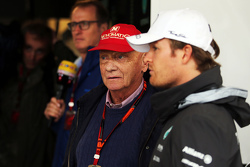 (L to R): Niki Lauda, Mercedes Non-Executive Chairman with Nico Rosberg, Mercedes AMG F1