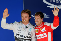 Polesitter Nico Rosberg, Mercedes AMG F1 Team and third place Sebastian Vettel, Scuderia Ferrari