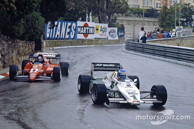 Keke Rosberg, Williams leads Patrick Tambay, Ferrari