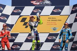 Podium: race winner Valentino Rossi, second place Casey Stoner, third place Chris Vermeulen