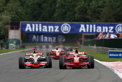 Kimi Raikkonen, Scuderia Ferrari overtakes Lewis Hamilton, McLaren Mercedes