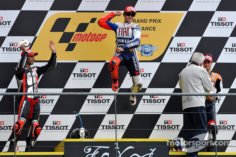 Podium: race winner Jorge Lorenzo, Fiat Yamaha Team, second place Marco Melandri, Hayate Racing Team