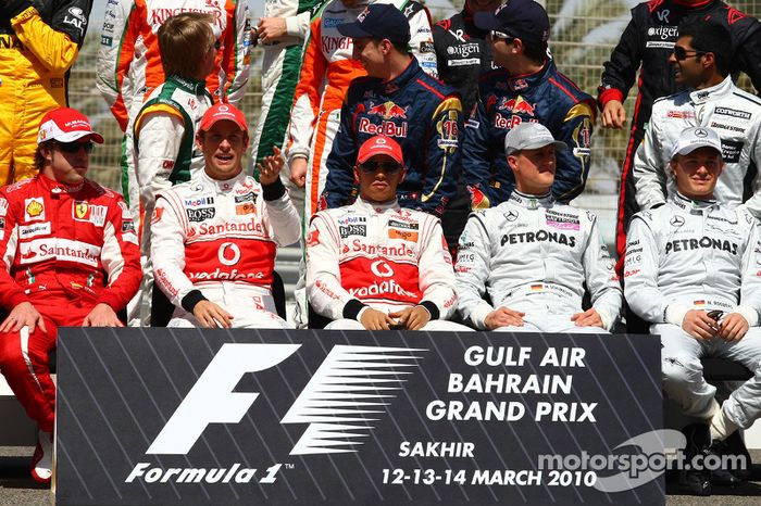 Fernando Alonso, Scuderia Ferrari con Jenson Button, McLaren Mercedes, Lewis Hamilton, McLaren Merce